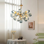Maison Ornate Crystal Glass Chandelier features golden LED ribbon-textured glass loops elegantly suspended.