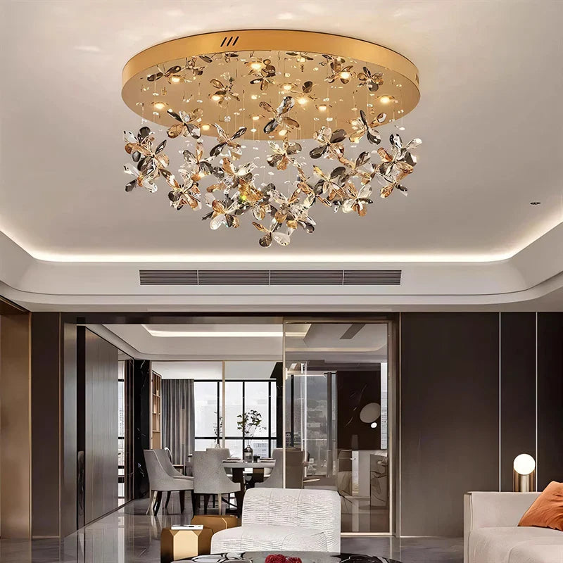 Maison Ornate Modern Crystal LED Pendant chandelier with gold metal and crystal floral design.