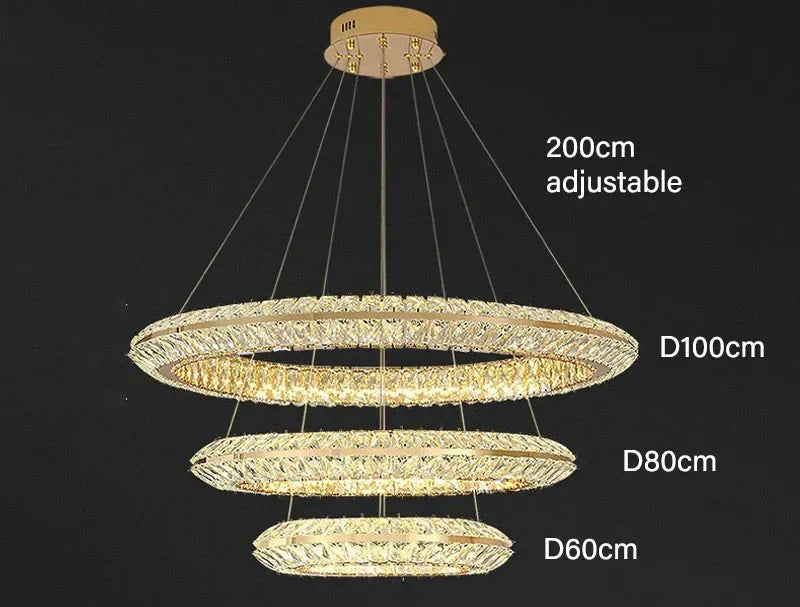 Maison Ornate Modern Crystal LED Chandelier with three crystal rings on adjustable suspension.