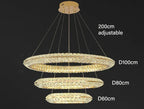 Maison Ornate Modern Crystal LED Chandelier with three crystal rings on adjustable suspension.