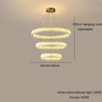 Modern LED chandelier with three adjustable crystal rings, tricolor dimming, and 200W/400W lighting options.