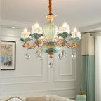 Maison Ornate six-arm European chandelier with gold, teal accents and hanging crystal pendants.