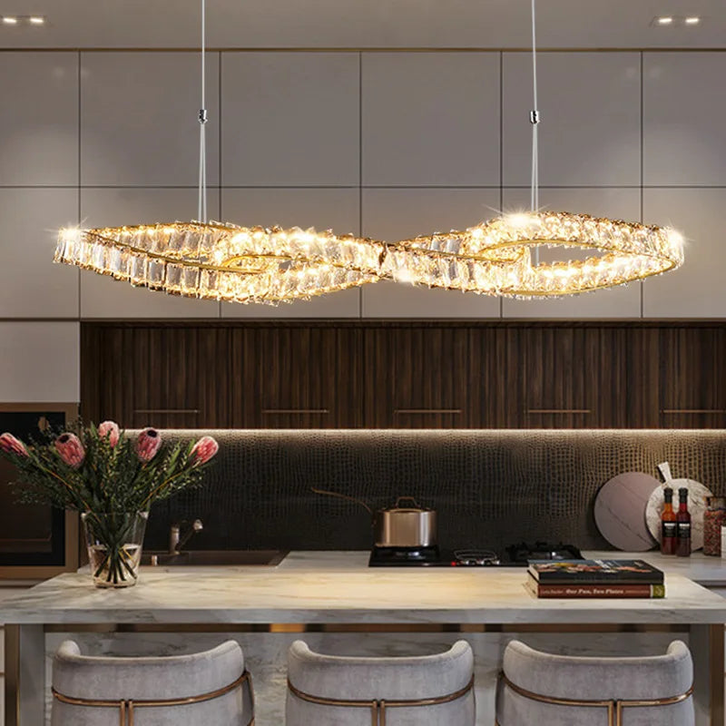 Maison Ornate Elegant Hanging Crystal Chandelier with modern LEDs in a twisted loop shape.