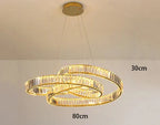 Art Deco chandelier with two minimalist LED rings, intertwined and suspended, 80 cm wide.