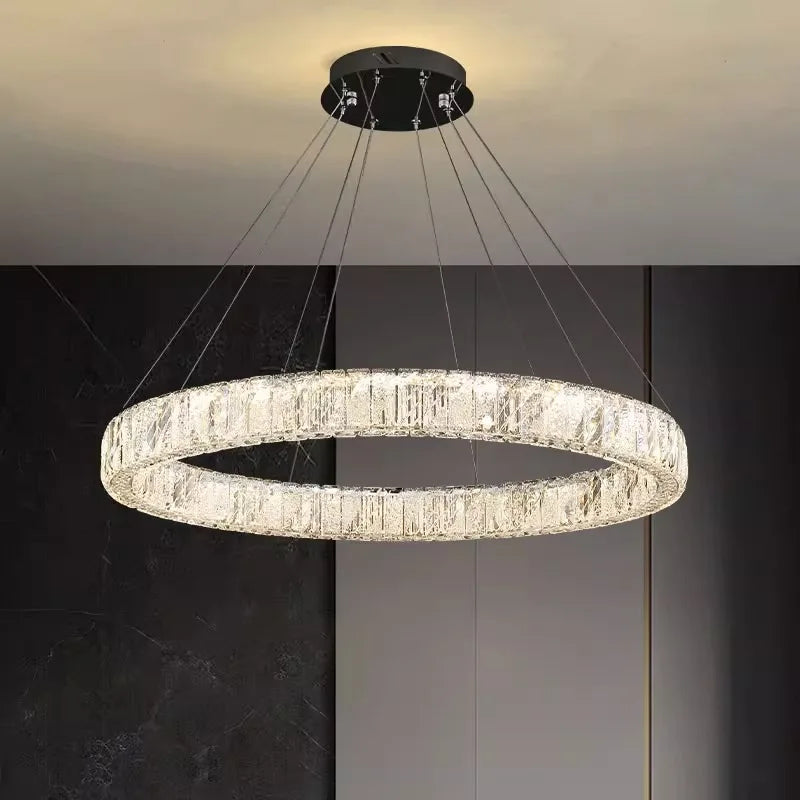 Maison Ornate Crystal Industrial Glass Pendant Light features dangling crystals and sleek metal accents.