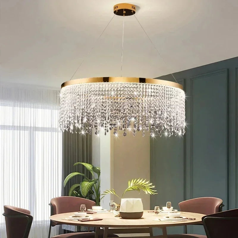 Maison Ornate Modern Crystal Chandelier with nickel frame and elegant crystal pendants, casting radiant light.