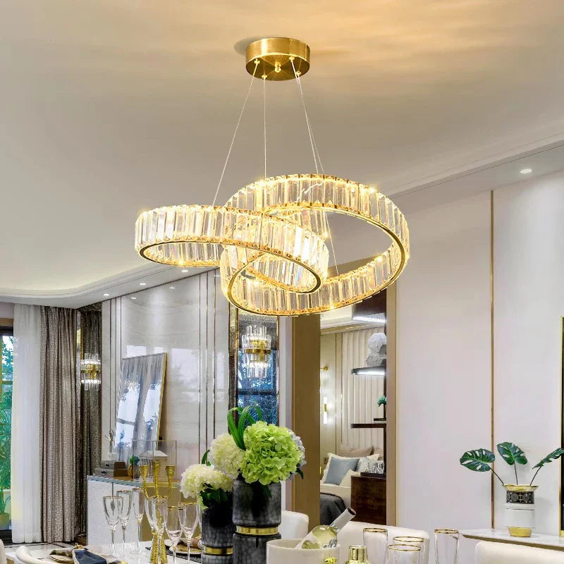 Maison Ornate Elegant Modern Industrial Chandelier with sparkling crystal glass elements and sleek metalwork details.