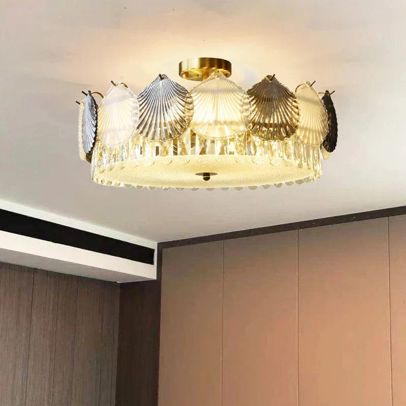 Ornate French modern crystal chandelier with LED, gold and silver shell accents, clear elements.