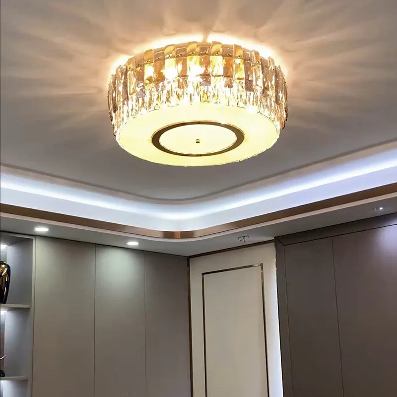 Maison Ornate Dimmable LED Crystal Glass Chandelier Round emits warm decorative patterns elegantly.