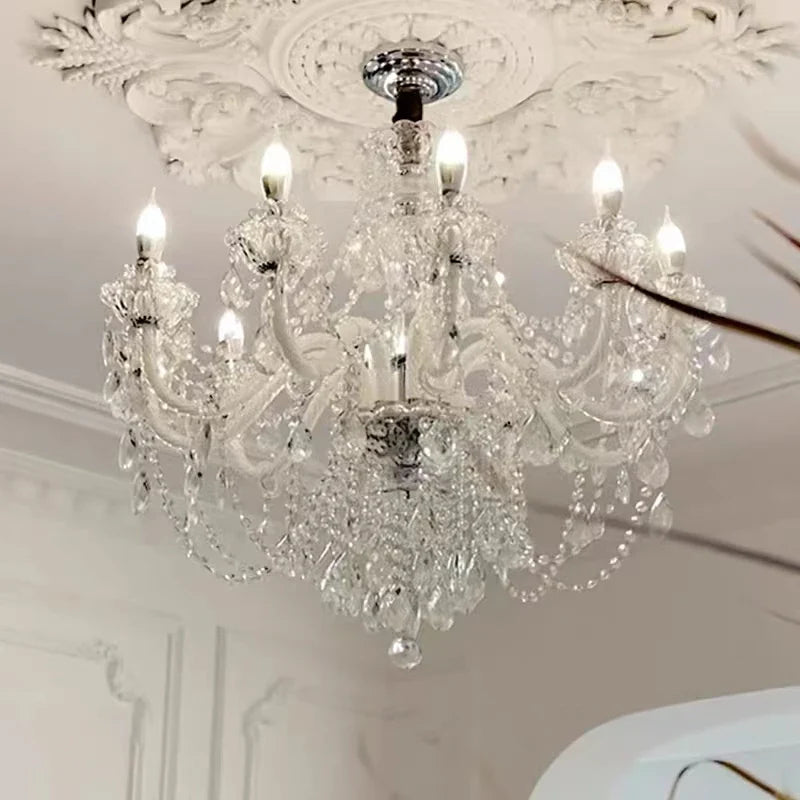 Maison Ornate Large Crystal Chandelier, LED and candle-lit, hangs from decorative medallion.