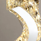 Maison Ornate Crystal Chandelier with curved stainless steel frame, LED lighting, faceted crystal details.