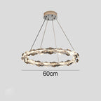Faceted ring chandelier with metal suspension, dimmable LED light, 60cm wide, four-wire hanging.