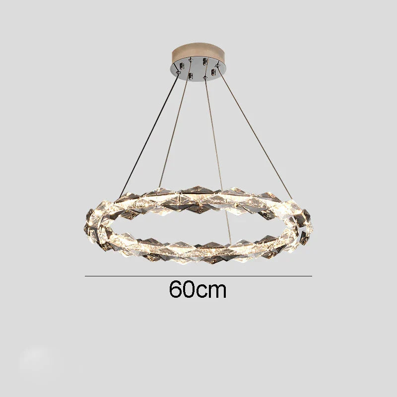 Faceted ring chandelier with metal suspension, dimmable LED light, 60cm wide, four-wire hanging.