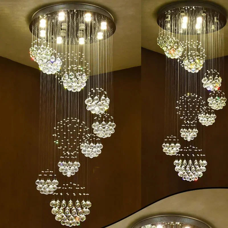 Modern crystal ball chandelier with stainless steel mount, multi-length drops, and sparkling LED lighting.
