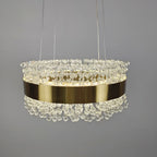 Gold band chandelier with clustered clear crystals, suspended by three thin wires, modern LED design.