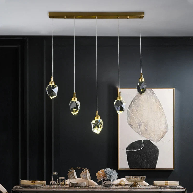 The Maison Ornate Nordic Crystal LED chandelier features five dimmable crystal pendants in a modern design.