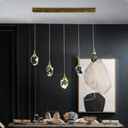 The Maison Ornate Nordic Crystal LED chandelier features five dimmable crystal pendants in a modern design.