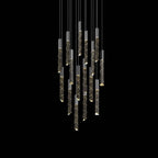 Modern crystal chandelier with elongated geometric glass pendants, sleek chrome frame, and warm illumination.
