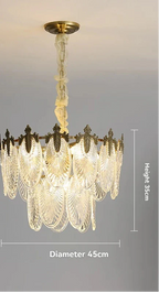 Gold-accented Art Deco chandelier with retro crystal leaf panels, 35cm high, 45cm diameter.