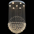 Modern spherical crystal chandelier with polished steel, LED top lights, and suspended crystal droplets.