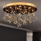 Gold and black circular chandelier with floral crystal accents, warm LEDs, modern style.