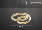 Modern chandelier with two interlocking crystal rings, integrated LEDs, and adjustable 120cm suspension wires.