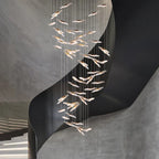 Maison Ornate Modern Crystal Chandelier with leaf-shaped gold and glass pendants, luxury lighting design.