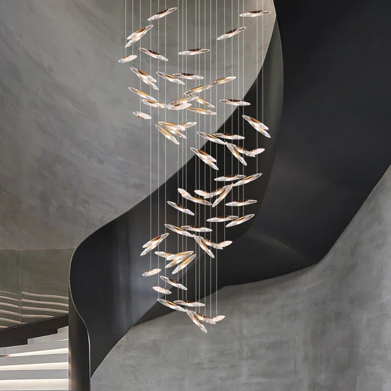 Maison Ornate Modern Crystal Chandelier with leaf-shaped gold and glass pendants, luxury lighting design.