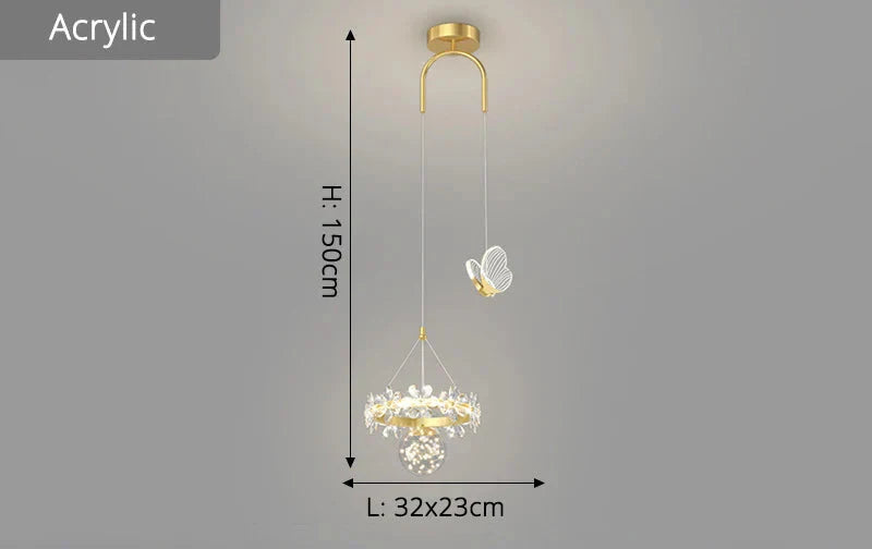 Maison Ornate Minimalist chandelier with gold mount, crystal ball, acrylic ring, and butterfly ornament.