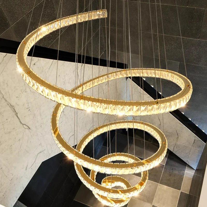 Maison Ornate Nordic crystal pendant light with gold accents, modern industrial chandelier styling.