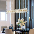 Maison Ornate Crystal Hallway Chandelier features light rings, floral elements, modern elegant design.