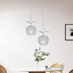 The Maison Ornate Modern Crystal Chandelier features sparkling crystals and a sleek, elegant silhouette.
