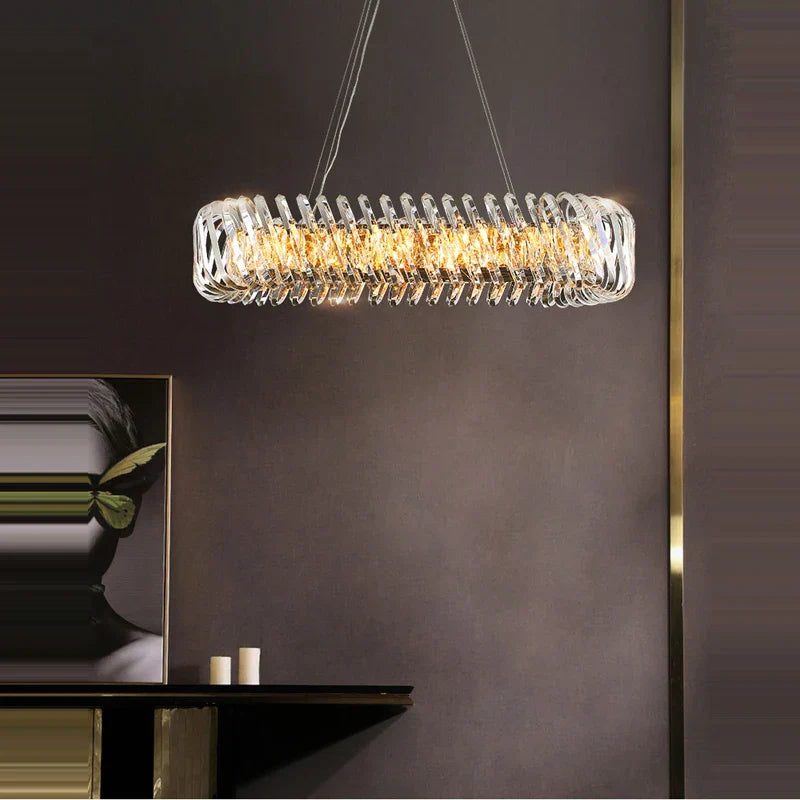 Modern Maison Ornate LED Crystal Chandelier, round spiral design, emits warm ceiling light.
