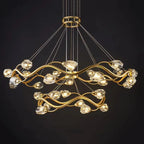 Two intertwined gold rings with crystal-like bulbs, LED chandelier, dimmable, thin suspension wires.