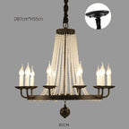 Elegant crystal chandelier with gold accents, tassels, and 8 candle-style bulbs by Maison Ornate.