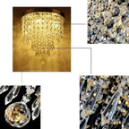 Polished metal chandelier with tiered crystal pendants and beads, glowing with warm golden light.