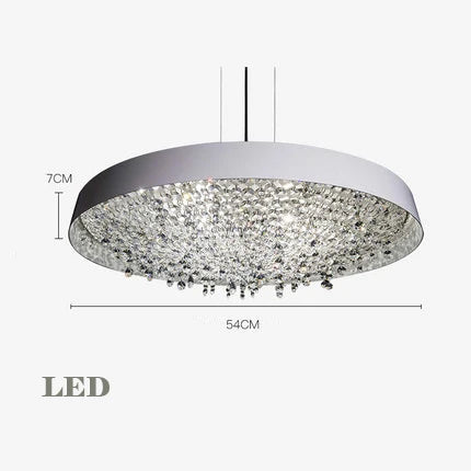 Modern round LED chandelier with silver rim, 54 cm wide, crystal accents for indoor elegance.
