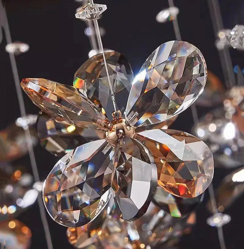 Maison Ornate Modern Crystal LED chandelier with flower-shaped crystals and multifaceted gold, silver, and clear petals.