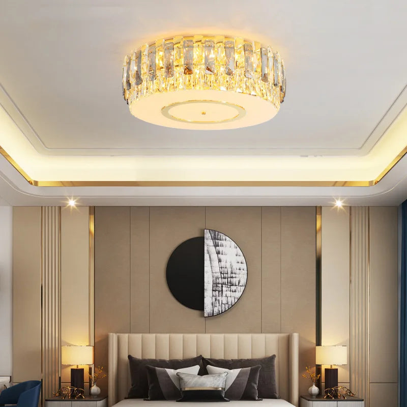 Maison Ornate’s Dimmable LED Crystal Glass Chandelier Round, elegant and luminous, suspended from the ceiling.