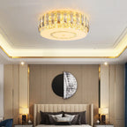 Maison Ornate’s Dimmable LED Crystal Glass Chandelier Round, elegant and luminous, suspended from the ceiling.