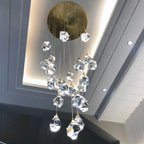 LED crystal chandelier with round gold base, multiple pendants for modern, elegant dining room lighting.