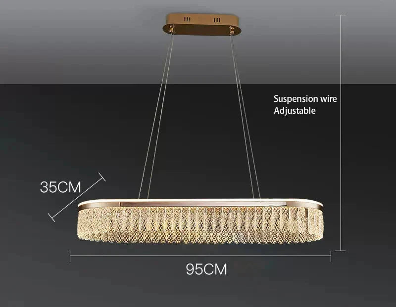 Rectangular gold chandelier with crystal ball accents, luxury rings, and adjustable suspension wires. 95x35cm.