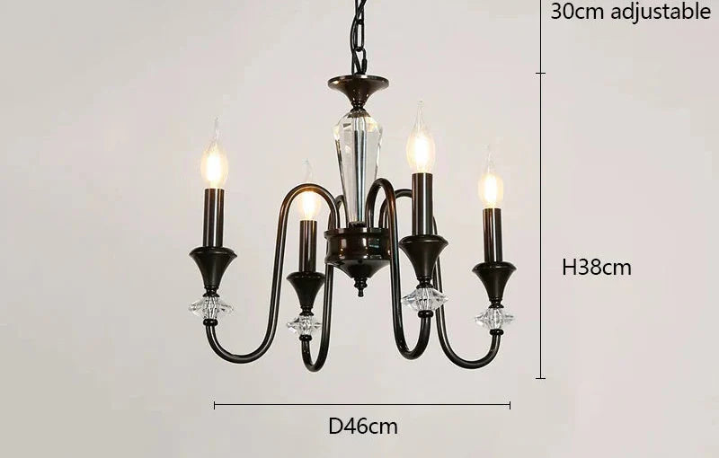 Black and silver Maison Ornate Vintage Crystal Chandelier with four candle lights, retro style.