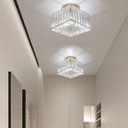 Two Maison Ornate Art Deco crystal chandelier adjustable lights with bright white illumination, geometric ceiling shadows.