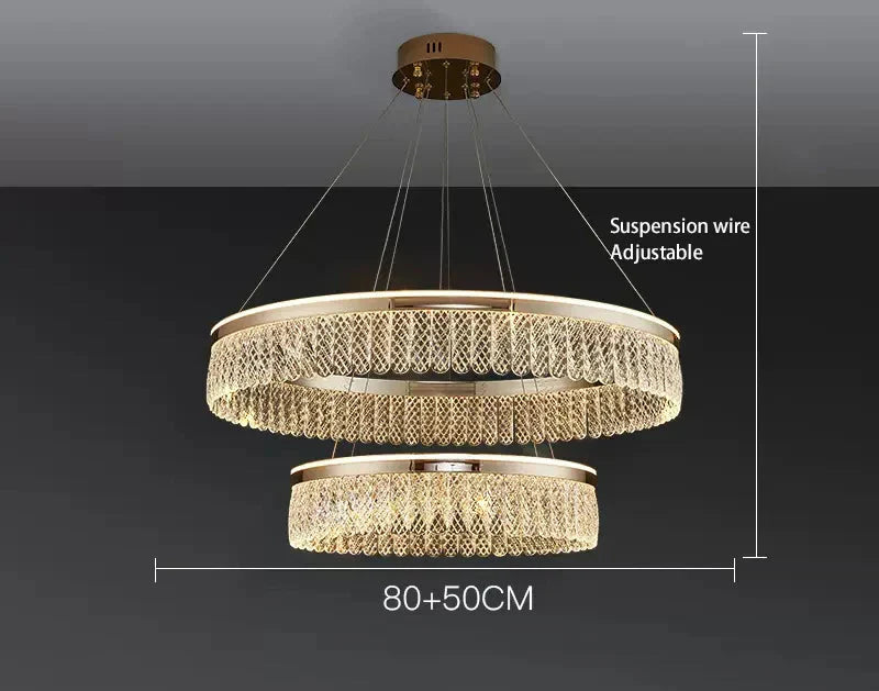 Luxury chandelier with double gold rings, crystal accents, and adjustable wires for modern elegance.