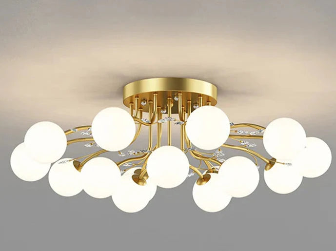 Maison Ornate Crystal Ball Chandelier with LED stars, clear glass, circular white globes design.