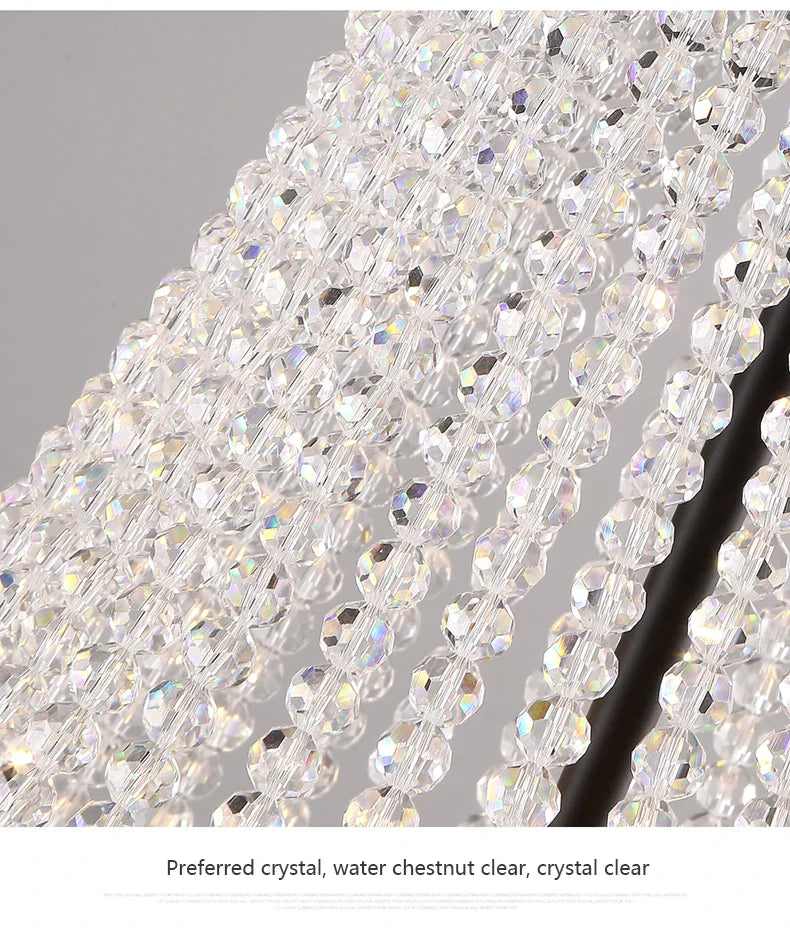 The Maison Ornate chandelier showcases faceted acrylic beads, iron details, and sparkling rainbow reflections.
