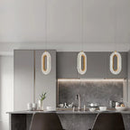Three Art Deco Crystal Chandeliers with gold emerald suspension, elegant and luxurious lighting fixtures.