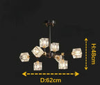 Modern crystal chandelier with seven cube glass shades on black and gold frame, LED lighting.