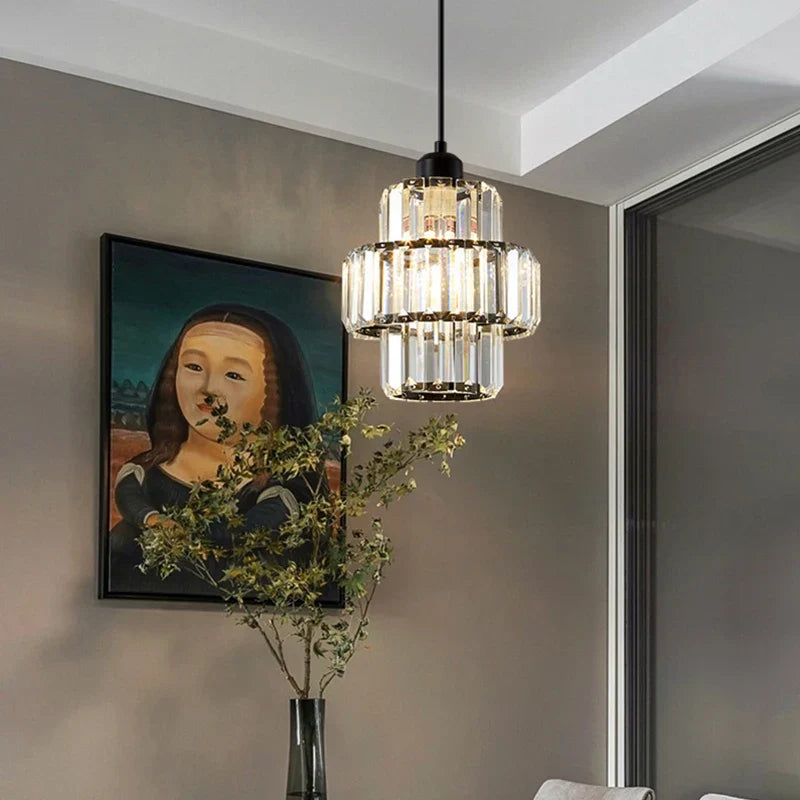 Maison Ornate K9 Crystal Art Deco Pendant Light featuring cascading crystals and a polished gold frame.